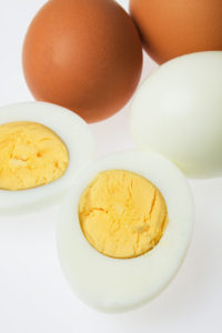 Close up image of hard bolied eggs on white background,not isola