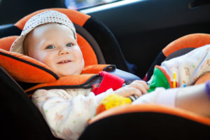 baby girl smile in car